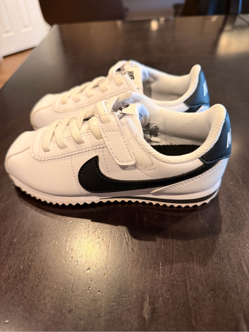 Nike Toddler Classic White Sneakers with Black Swoosh